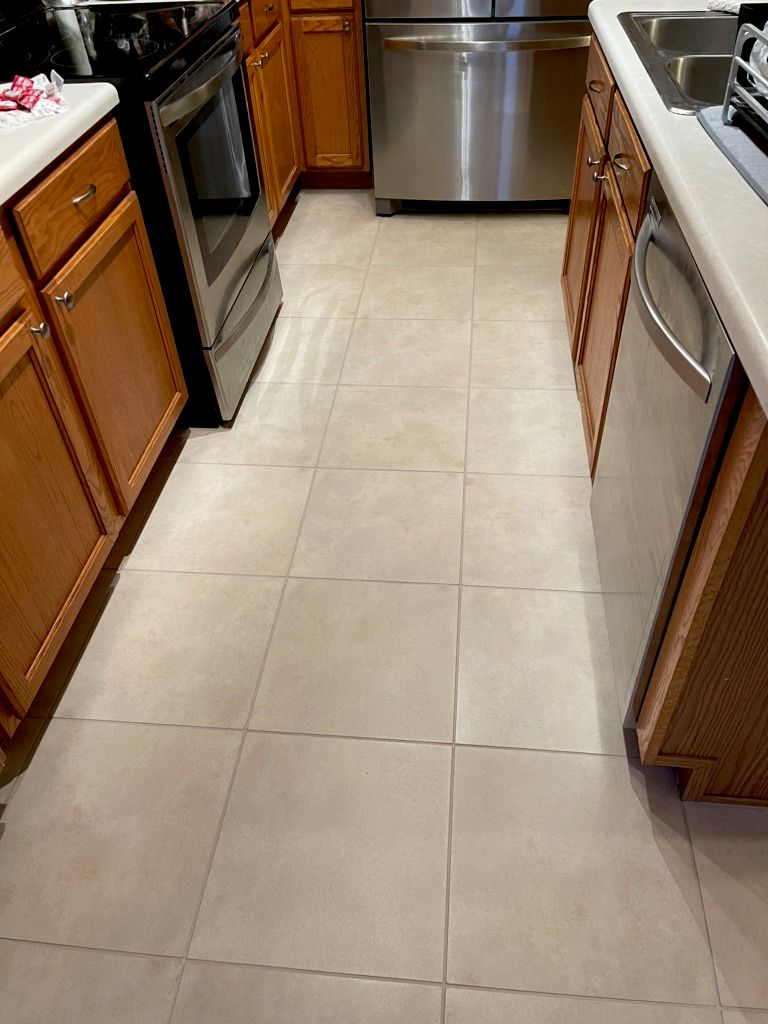 Removed sealer coating/cleaned/grout color sealed