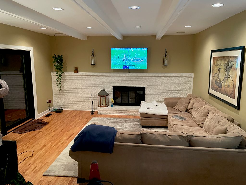 (2/3) AFTER: 55” TV Over Fireplace.