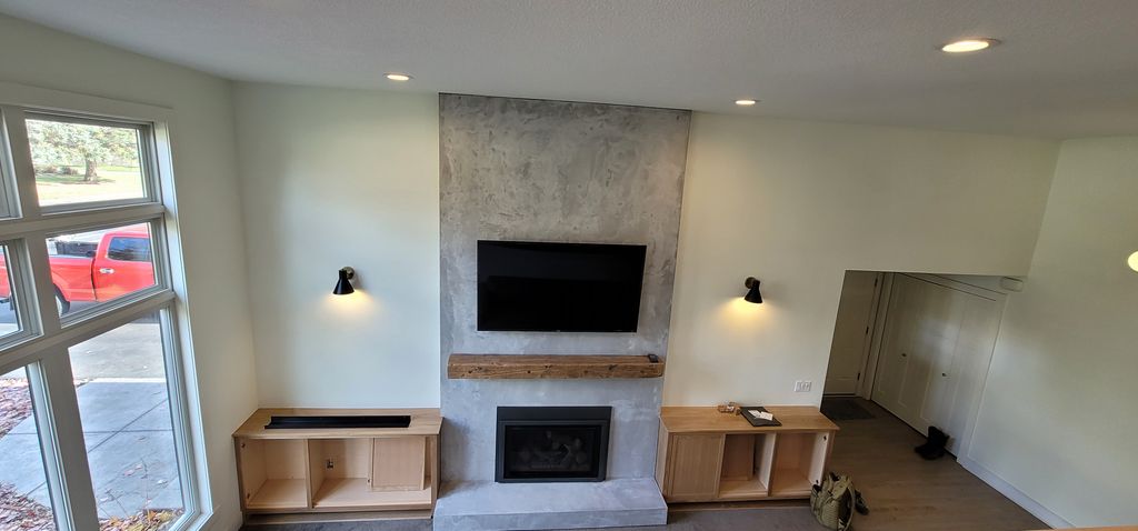 Custom stucco fireplace, patches where the lights 