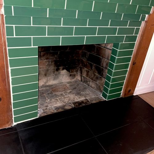 Installed tile around my fireplace.  Added on a ch