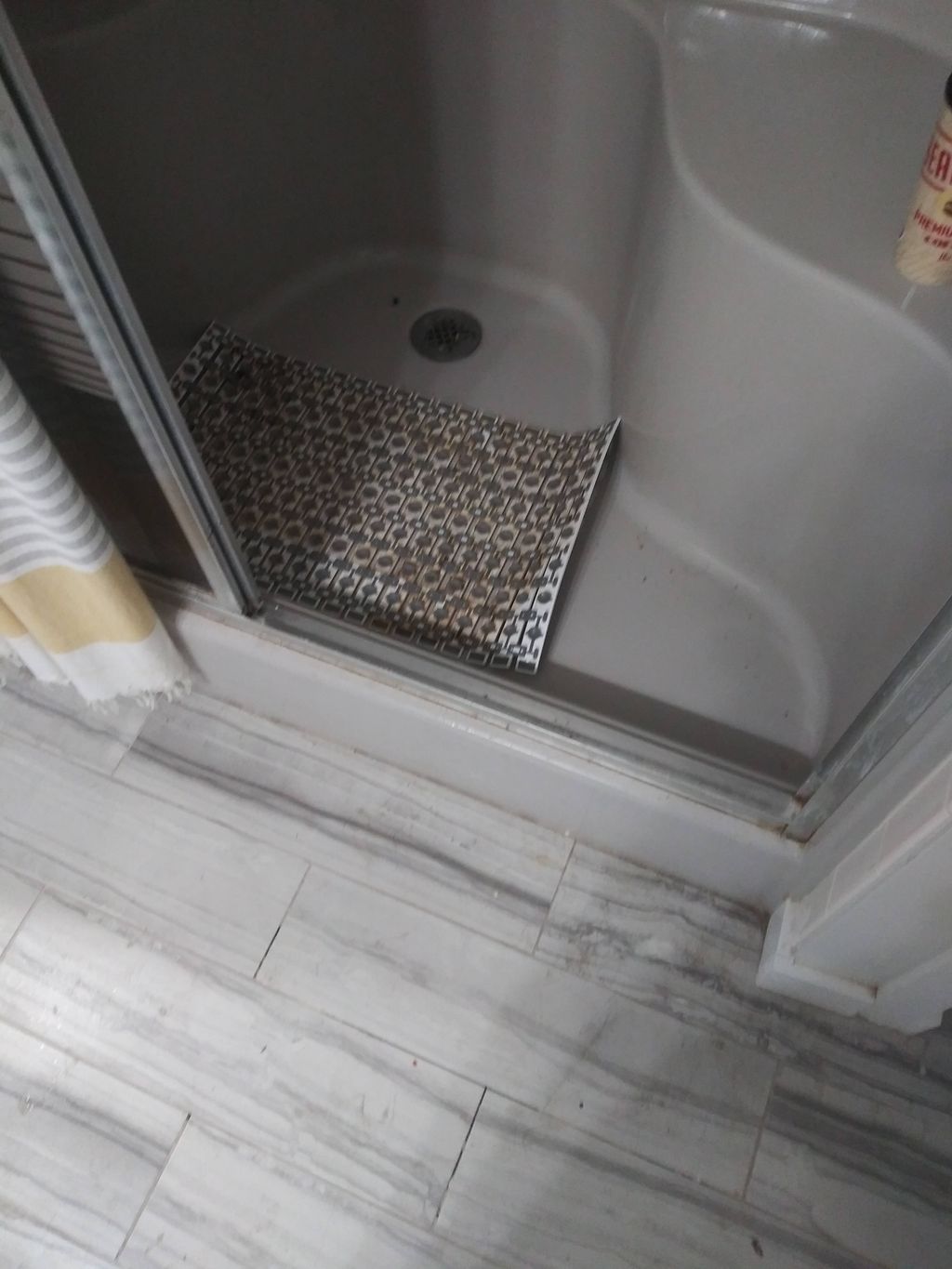 K.W. mat that she said I didn't clean. Impossible 