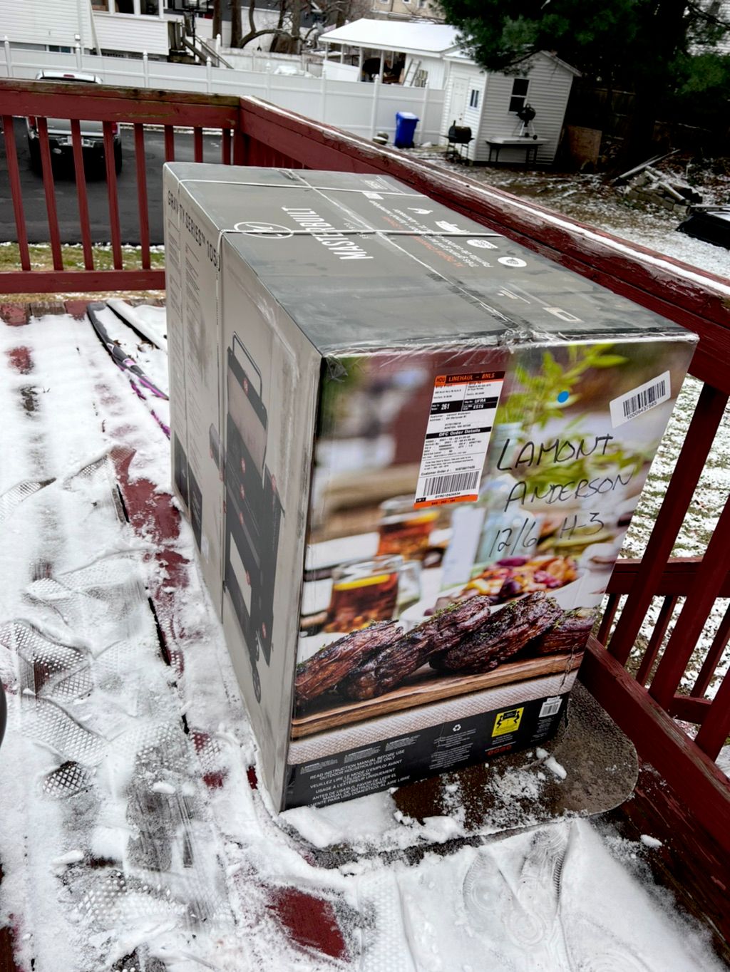 300lb grill in the box moved from ground level to 