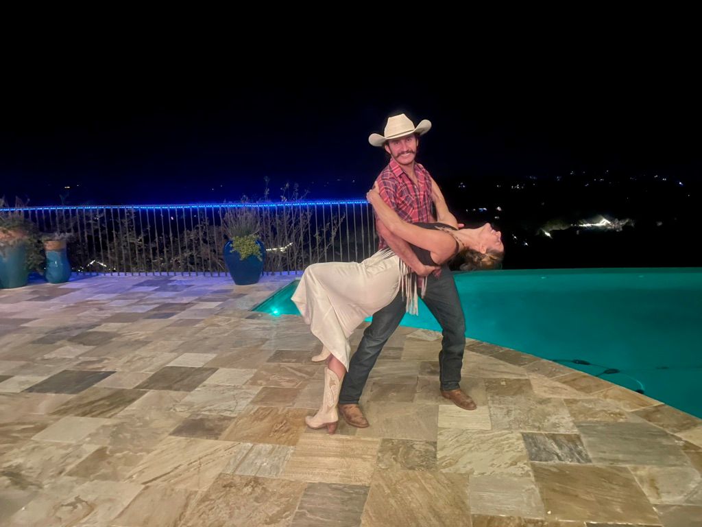 Cristo and Allyson showing off for the party peopl