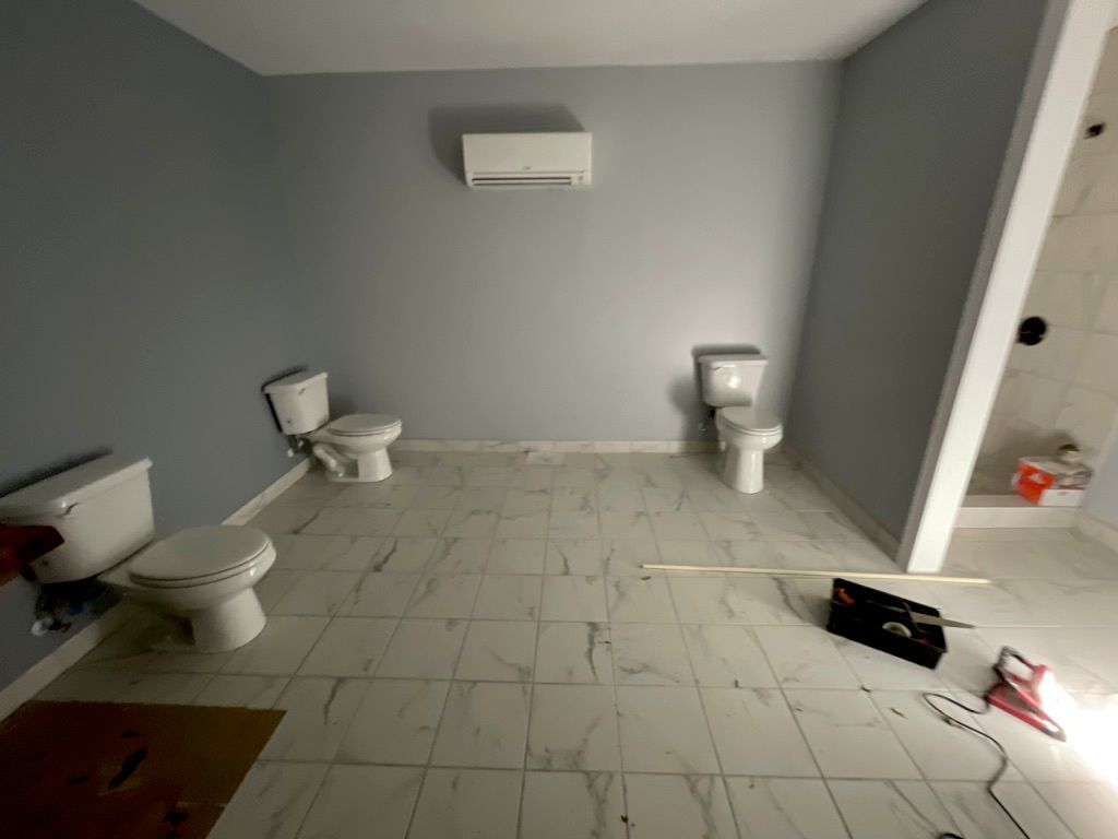 (2) 3 toilets installed. 