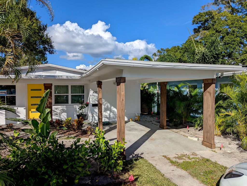 hid existing metal pillars with wood