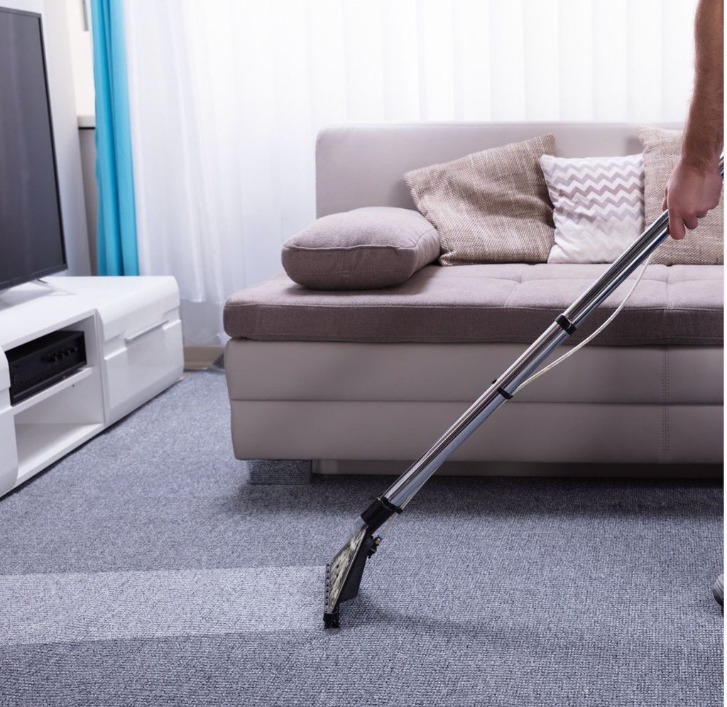 Before and after of living room carpet