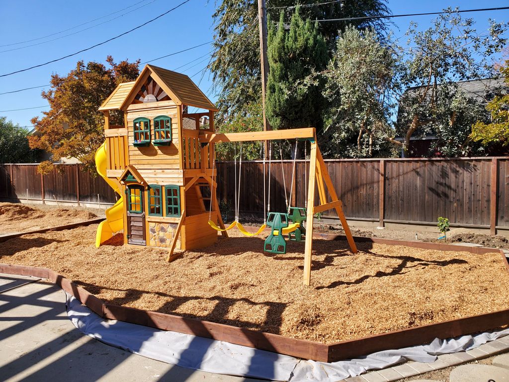 Swing Set Assembled with Border and Wood Chips