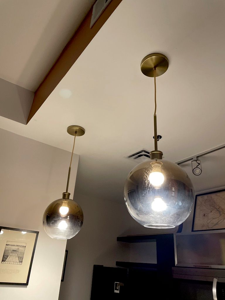 Ernest replaced two pendant lights. The work was q