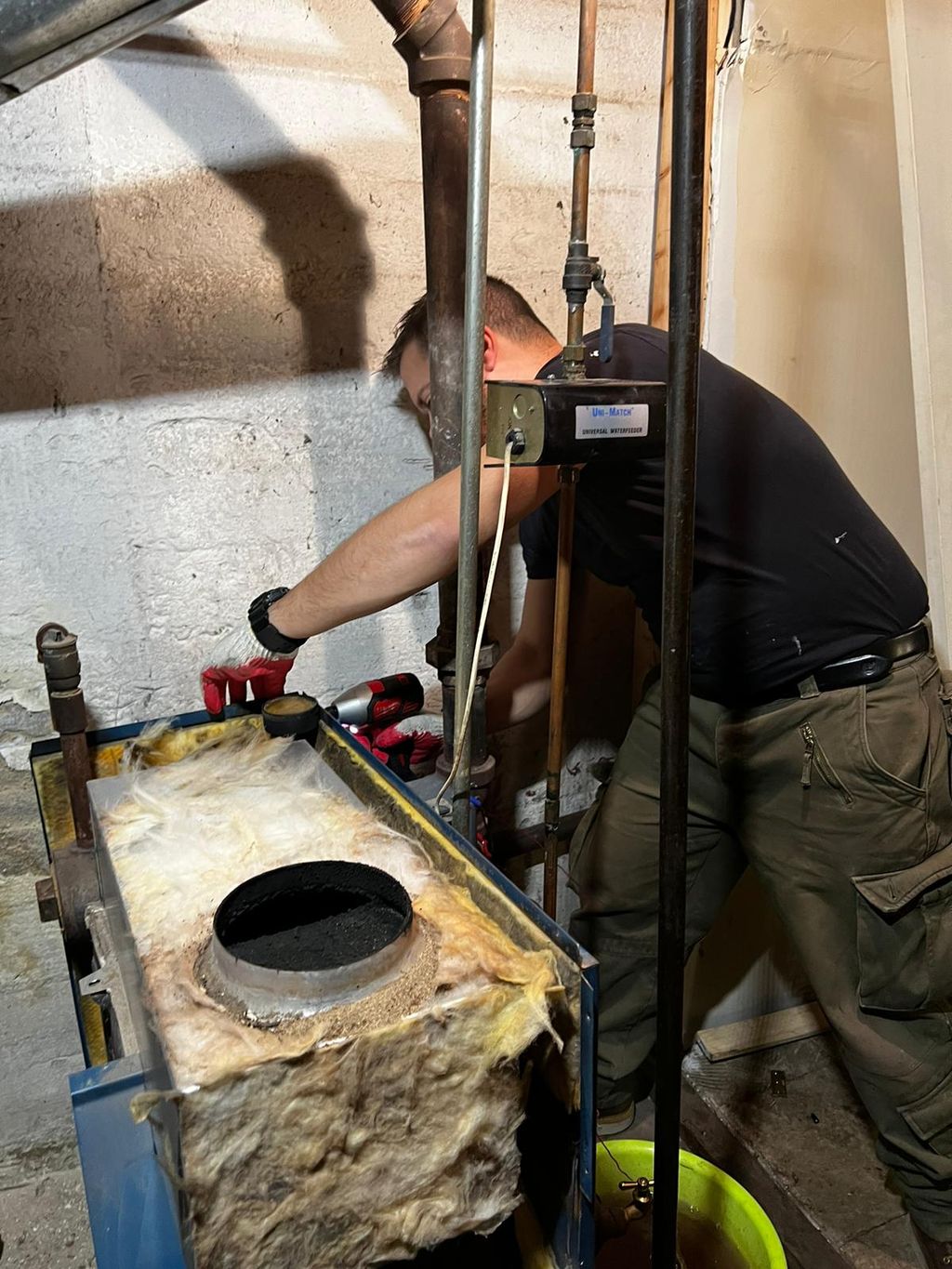 Our mechanic cleaning the boiler