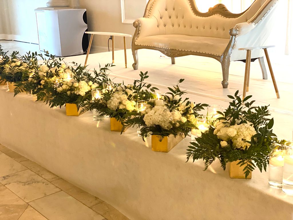 Wedding Stage lined with florals