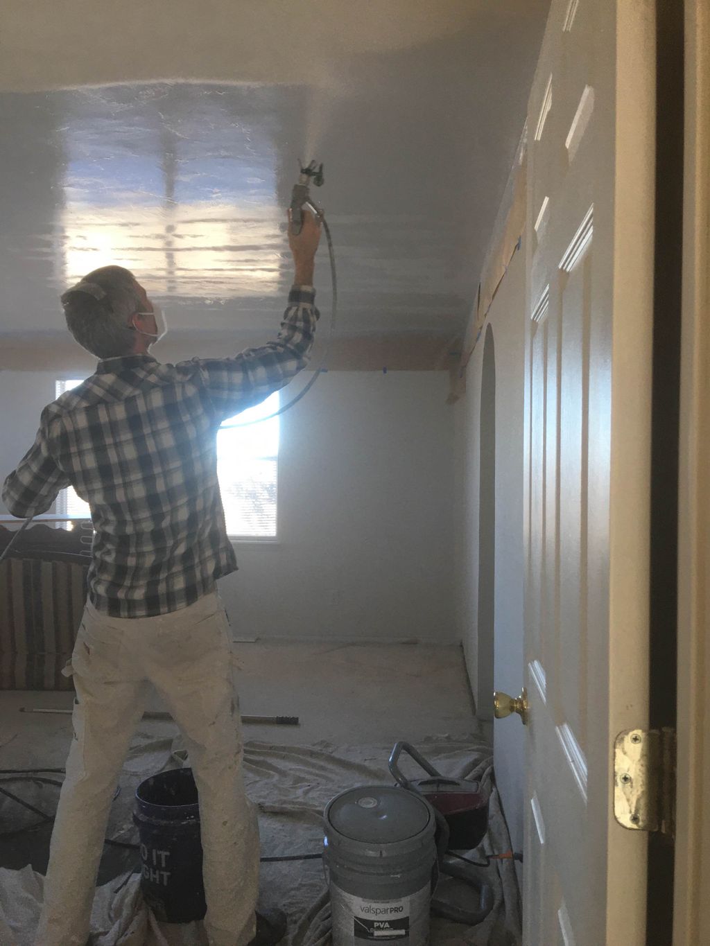 Priming the newly textured ceiling