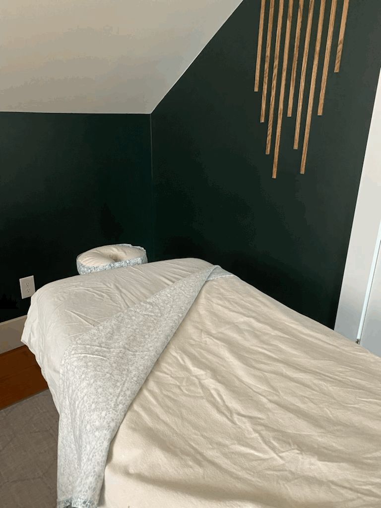 Heated massage table