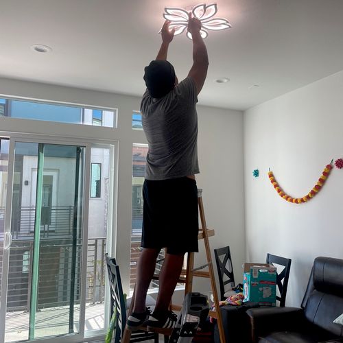 Putting in work installing customers lights