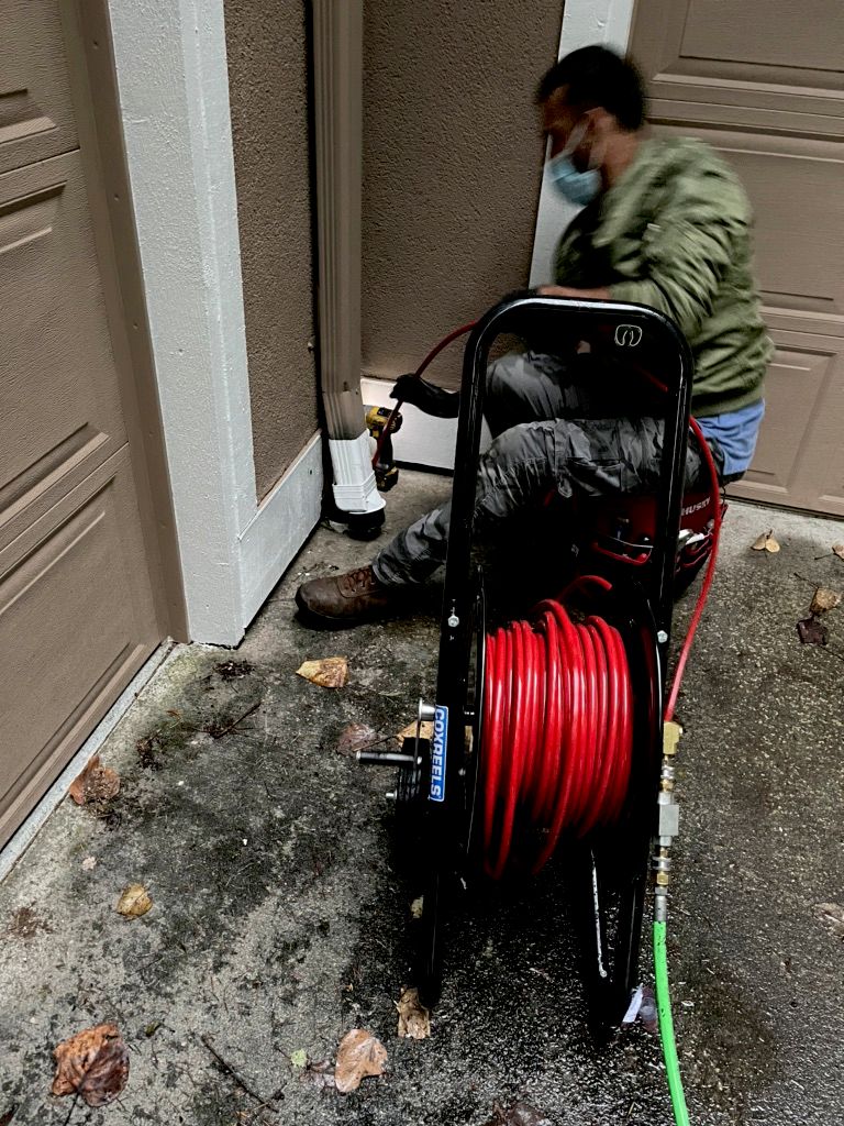 Hydro jetting downspout clog