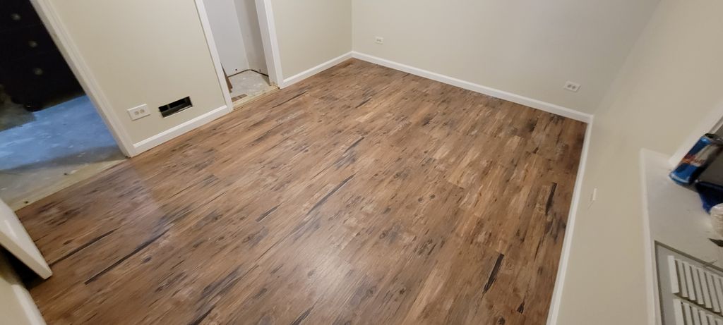 New vinyl flooring and base boards