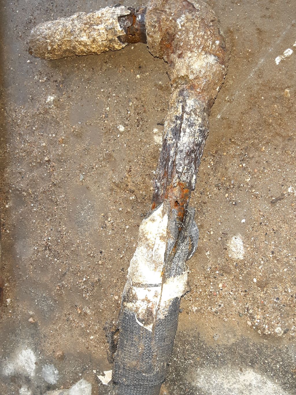leaking very aged galvanized hot water supply pipe