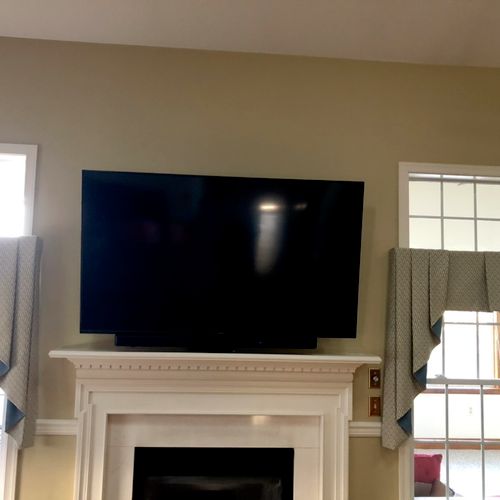KES hung my TV and sound bar above my gas fireplac