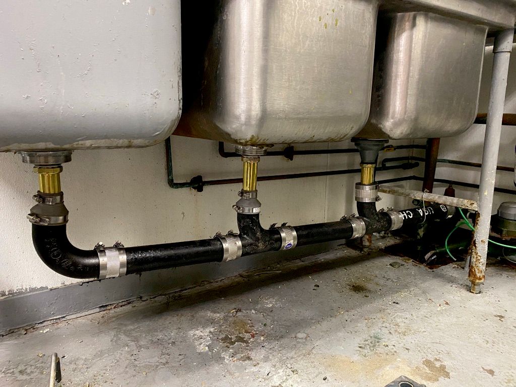 Triple sink drain line
