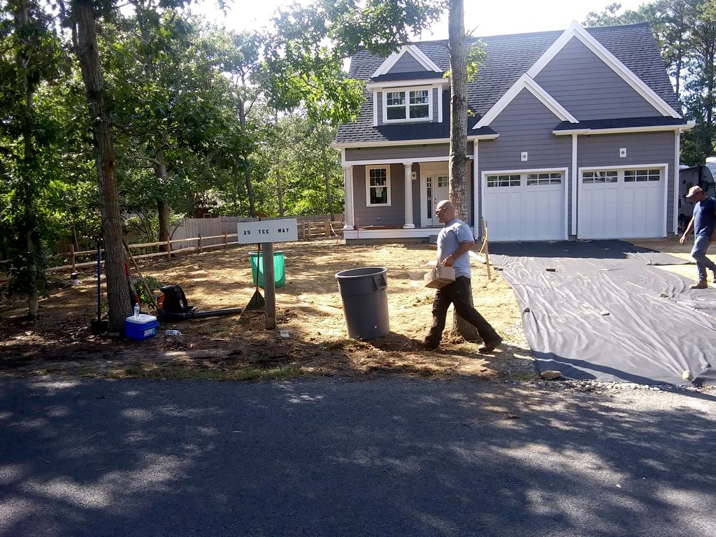 Me and cowboy building a cobblestone lined drivewa
