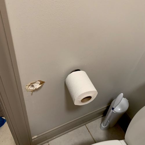 Toilet paper holder broken off wall