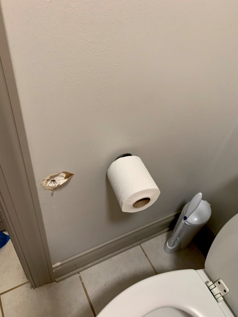 Toilet paper holder broken off wall