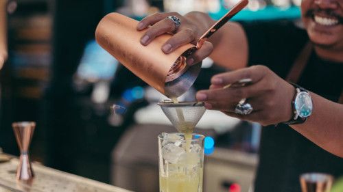 Pouring a tasty Margarita on the Rocks!!