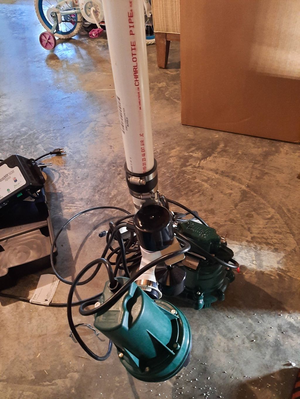 Sump pump with battery back up system