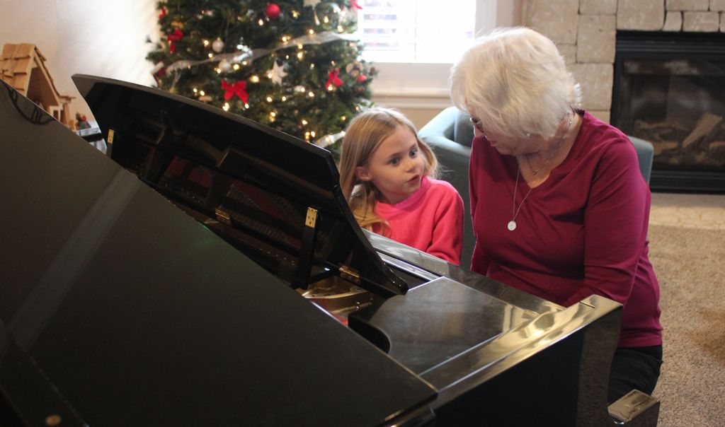 Playing duet with young student - Carol Parks - Al