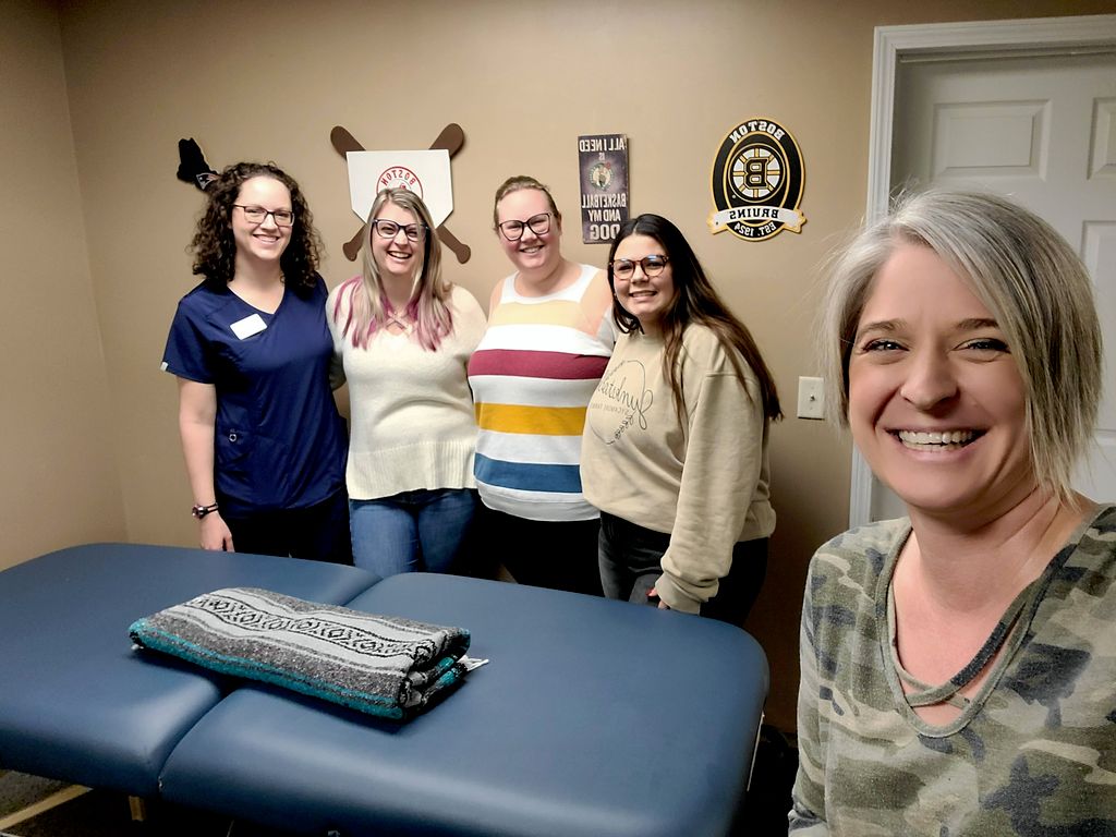 All smiles after a corporate therapy treatment eve