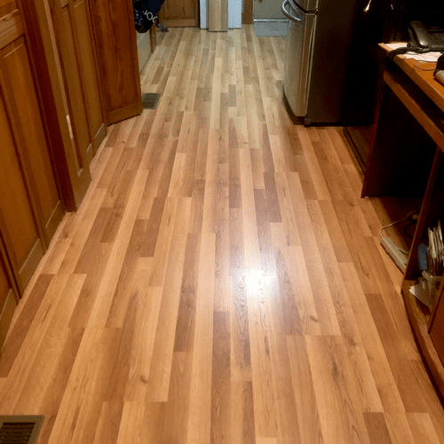 Upgraded flooring and repaired trim