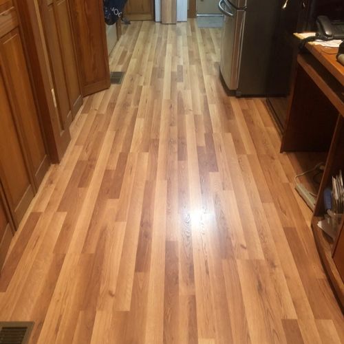 Tom laid new flooring down throughout our entire m
