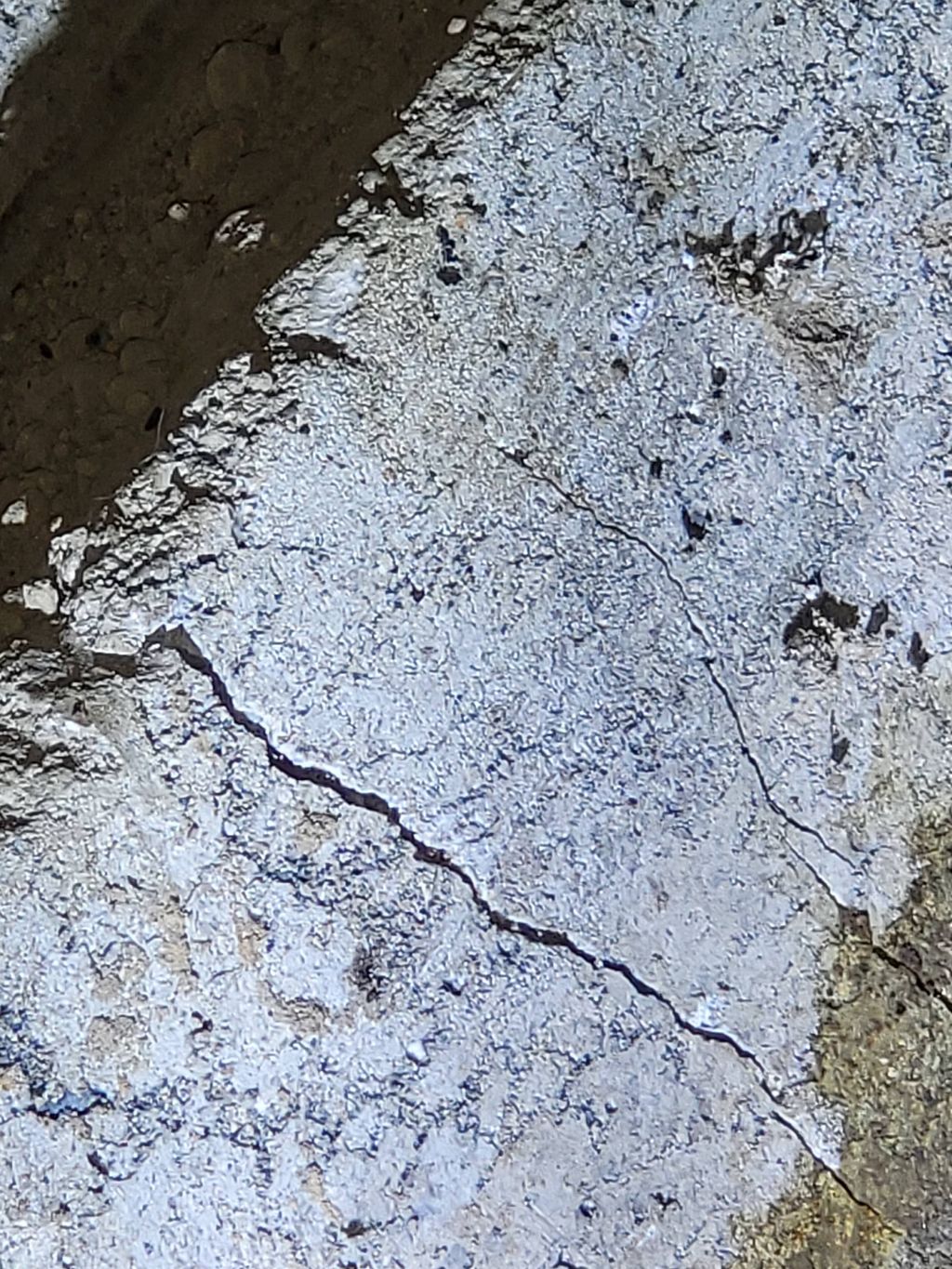 inspecting Crack in crawlspace- sings of settlemen