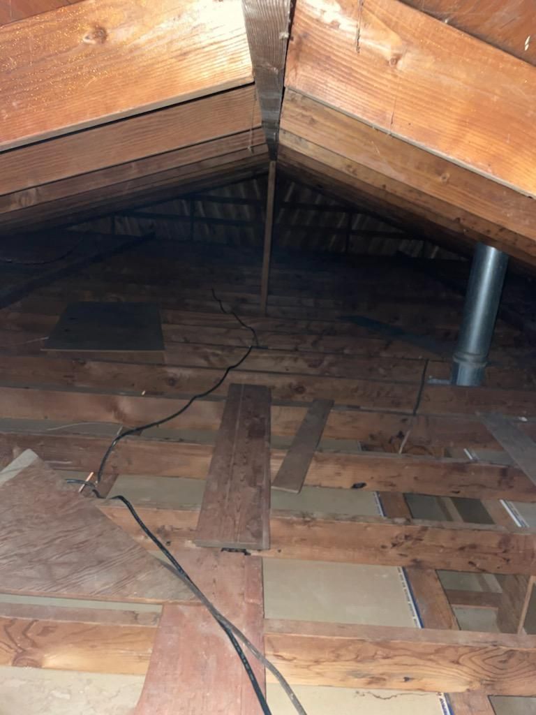 Completed removal of asbestos insulation in attic 