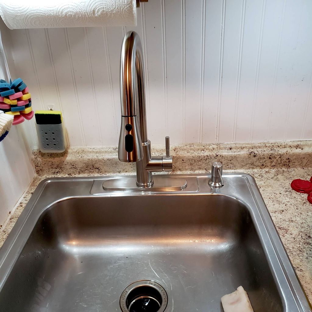 new faucet with touch feature. Soap dispenser in r