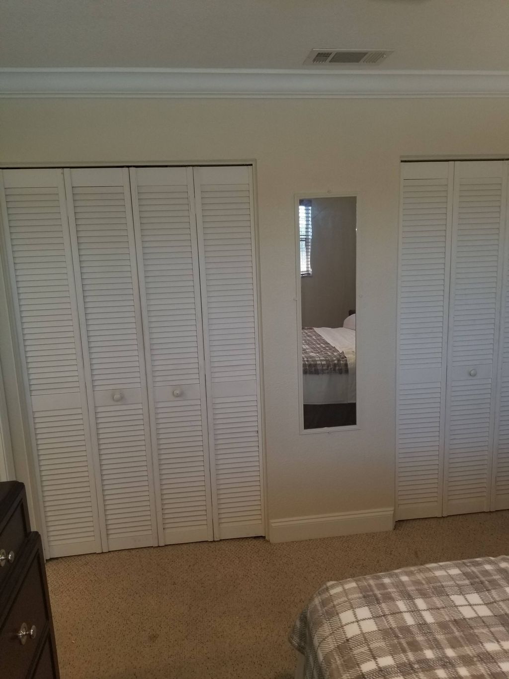 New crown molding and double bi-fold doors.