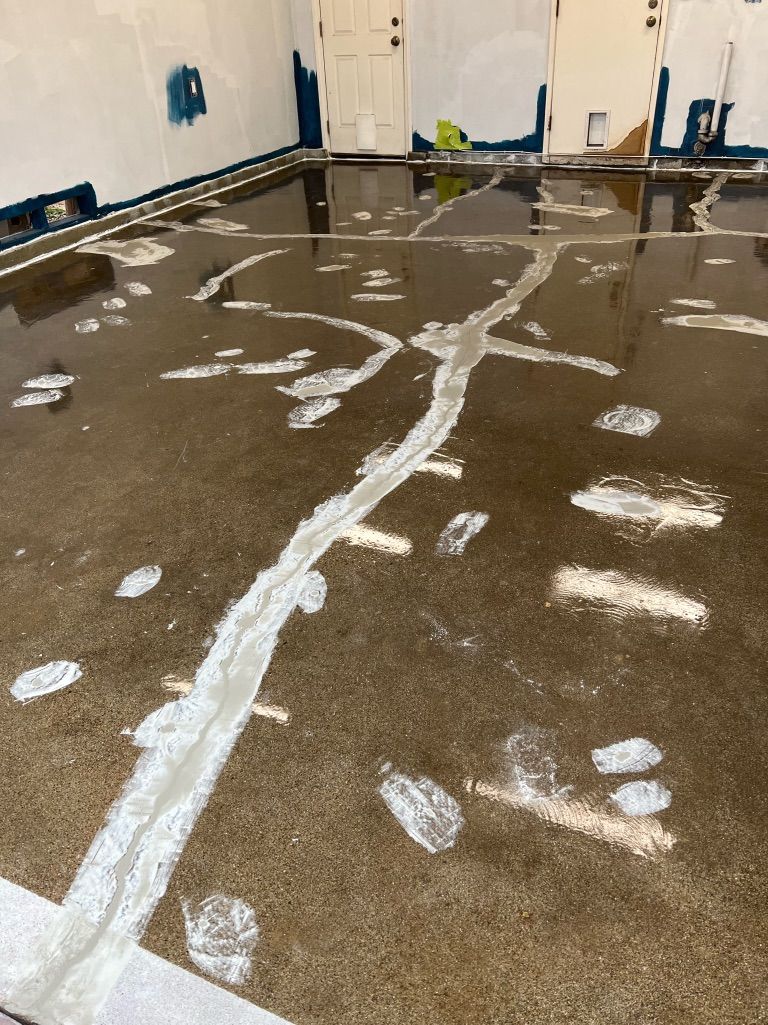 Prep work: Patching and moisture block applied