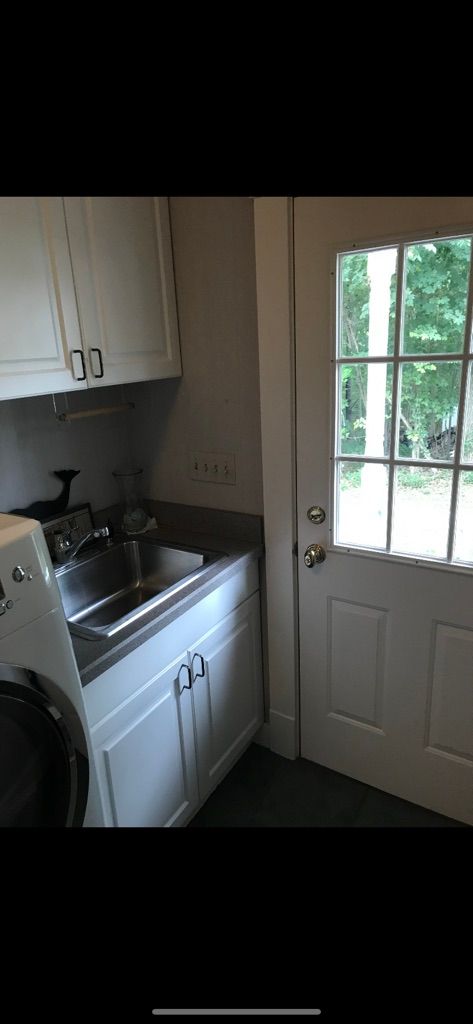 Laundry room before