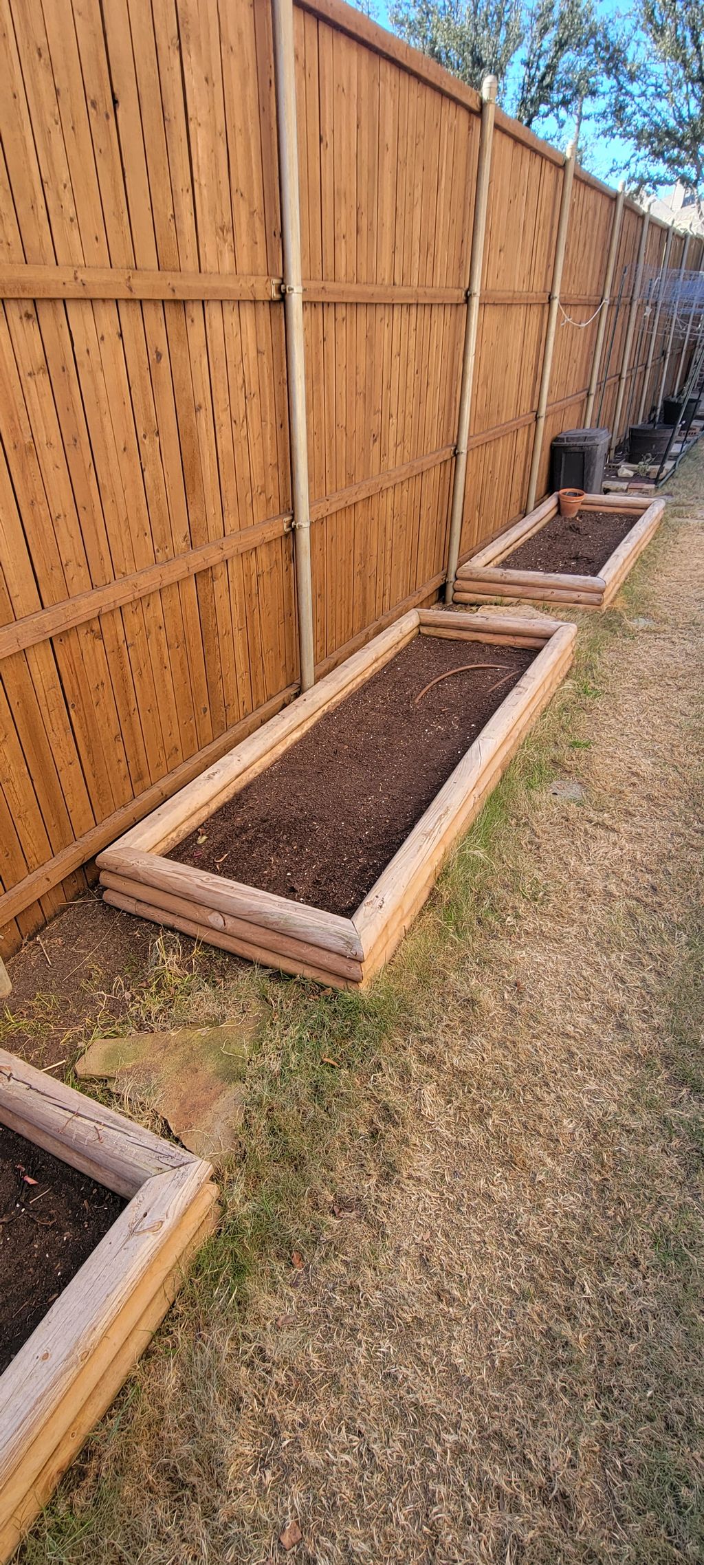 Vegetables bed clean up and added planting mix 50%