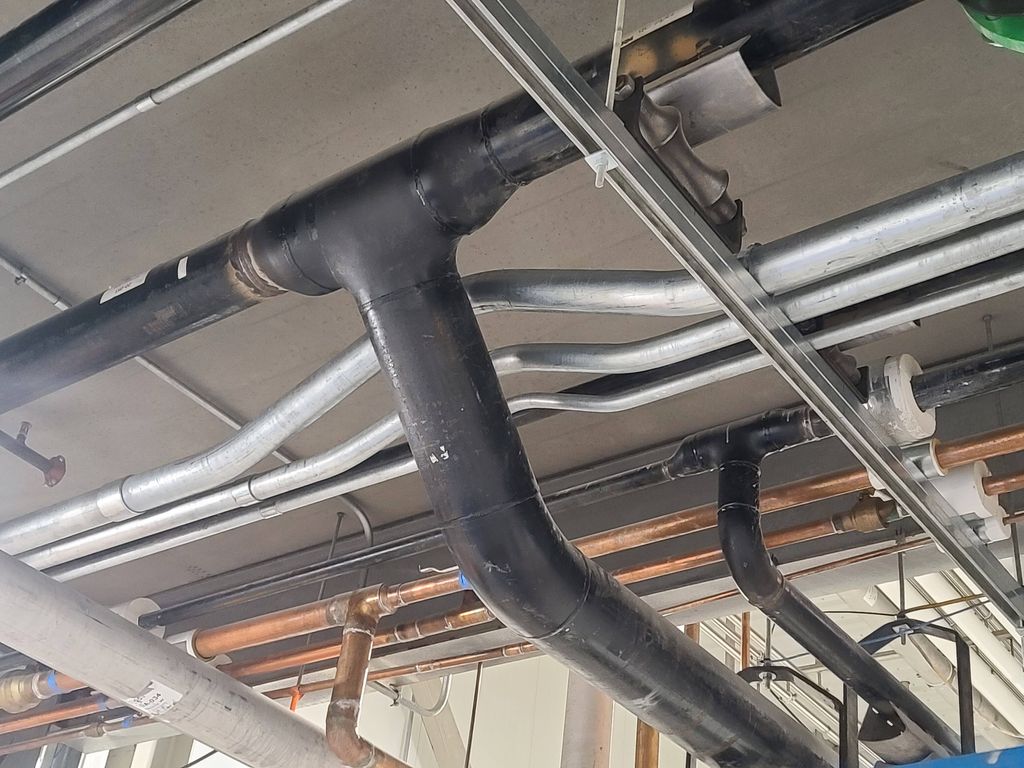 3 bend saddles over a steam line. 