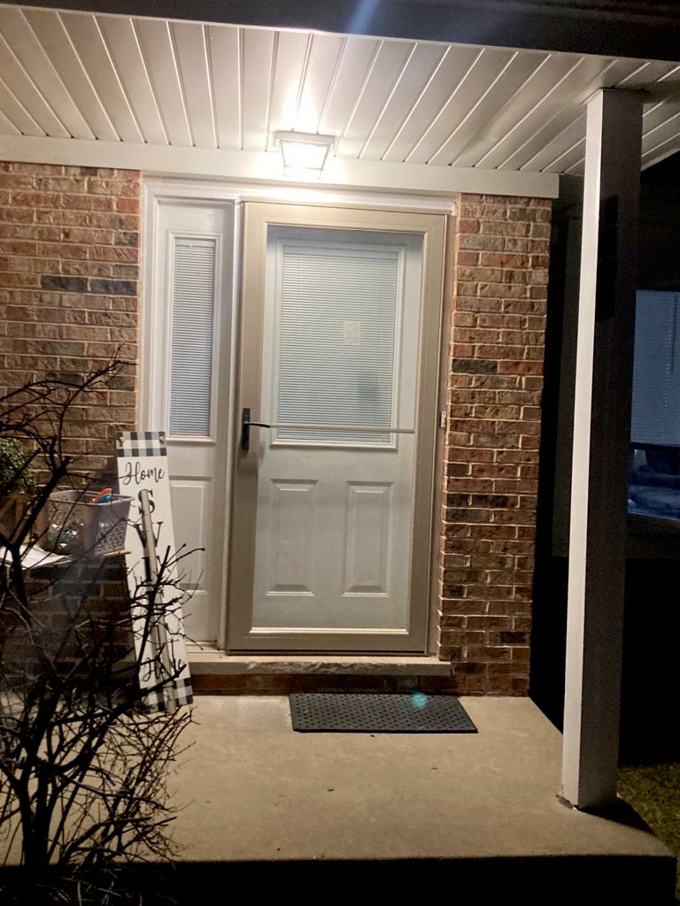 Storm door with retractable screen installation 