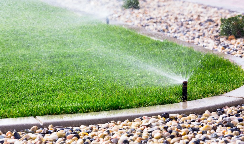 test lawn sprinkler system in spring