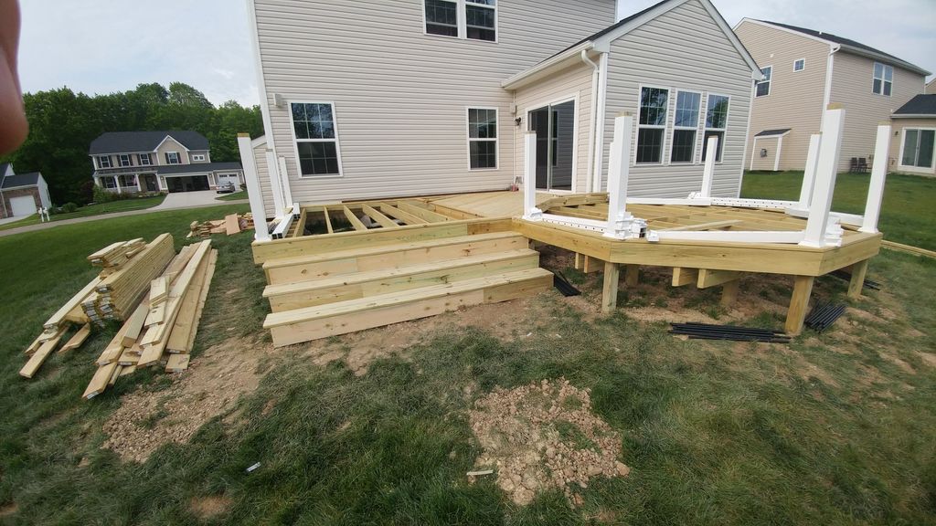 New wood deck with octagonal accent and vinyl rail
