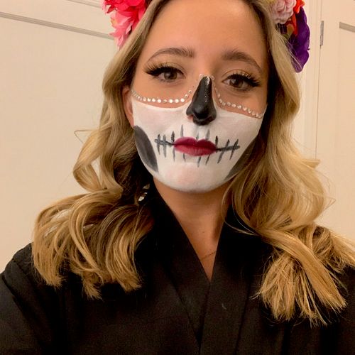 Incredible job! Day of the dead makeup job for a p