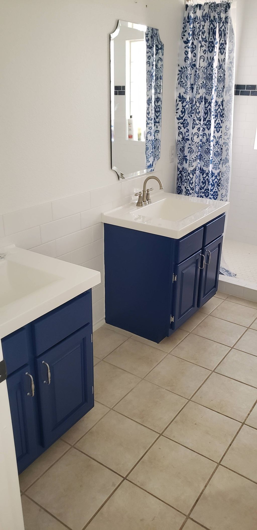 cabinet painting, backsplash tile work, and vanity