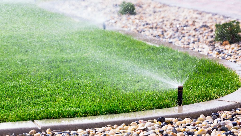 sprinkler watering lawn