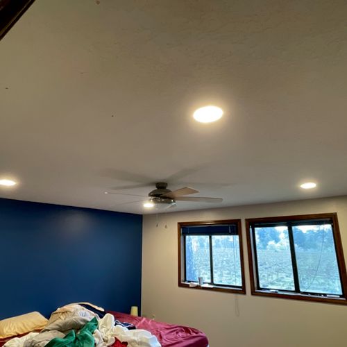 Install of 10 recessed lights in two rooms. Excell