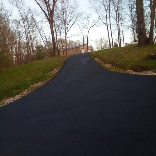 We have an 8 year old, 300 foot, hilly asphalt dri
