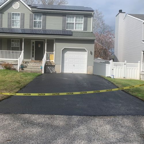 Driveway after our Sealcoating 🦭😄