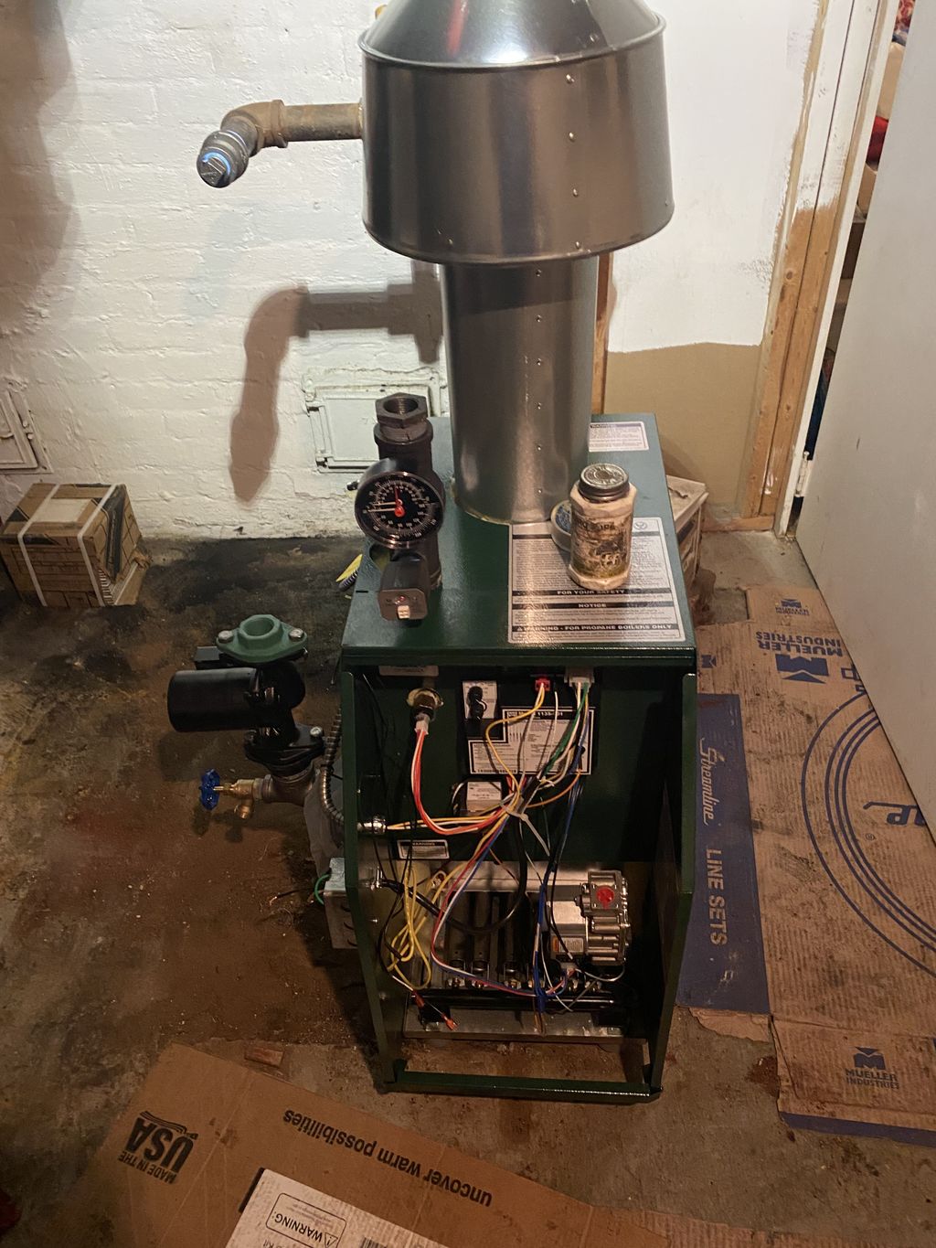Continuation of gas fired boiler installation 