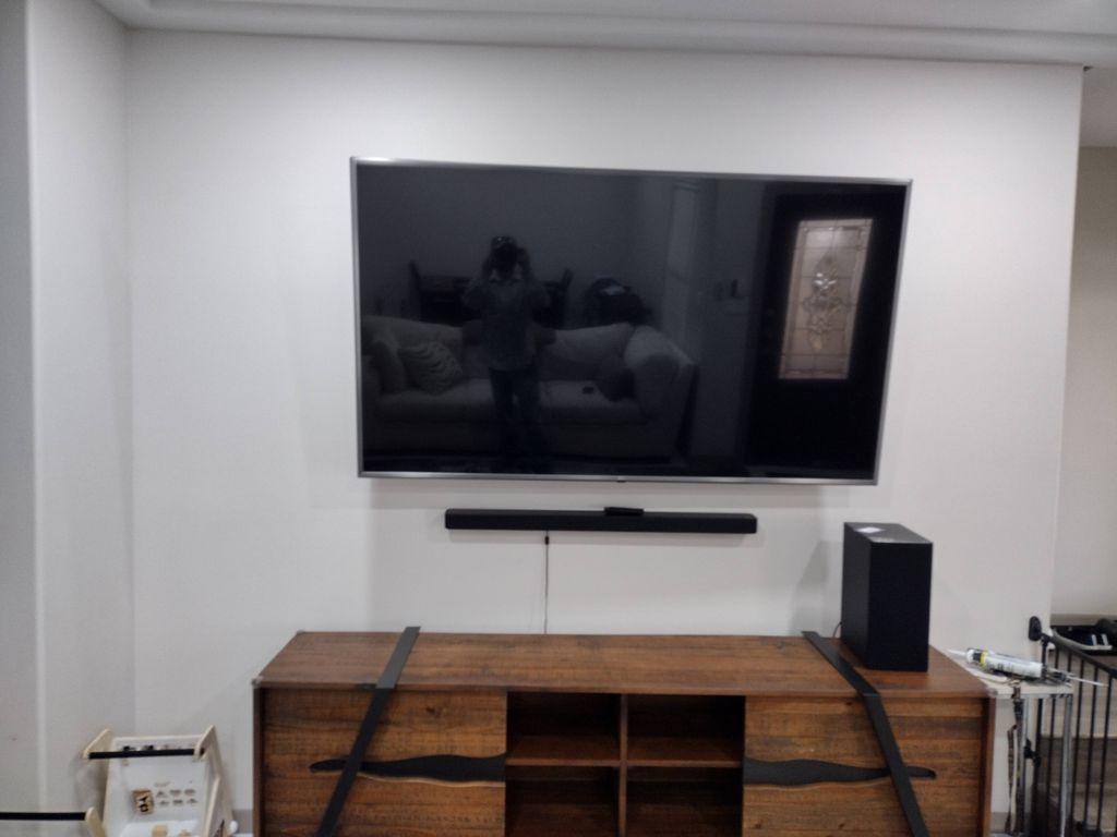 75" TV wall mounted with outlet concealed